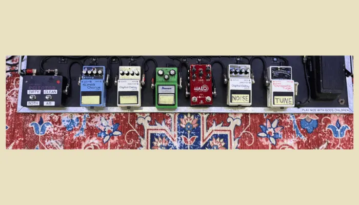 Dave Navarro's dual-path pedalboard featuring Boss DD-3 Delays, CH-1 Chorus pedals, Keeley Halo Delay, Ibanez TS-9 Tube Screamer, and CryBaby Wah, controlled by a Whirlwind Selector switch.