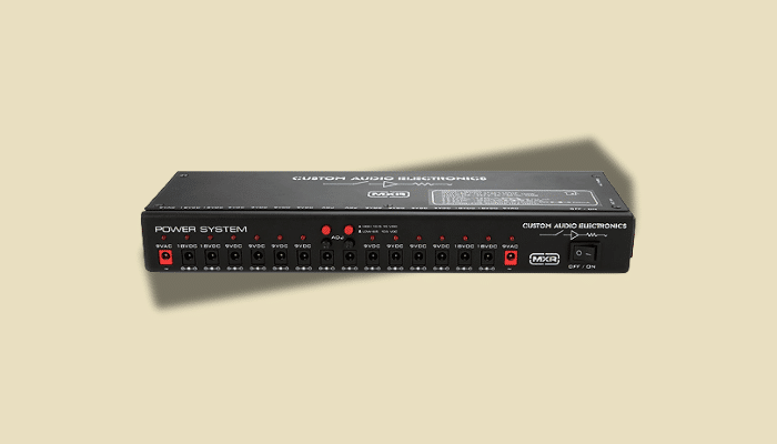 MXR Custom Audio Electronics Isolated Power Supply featuring multiple isolated outputs providing clean, noise-free power to professional pedalboards while eliminating ground loop hum and preserving tonal integrity.