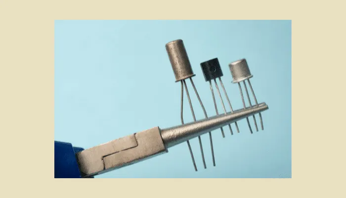 Three types of transistors used in guitar pedals, including classic germanium and silicon components, shown side by side for comparison.