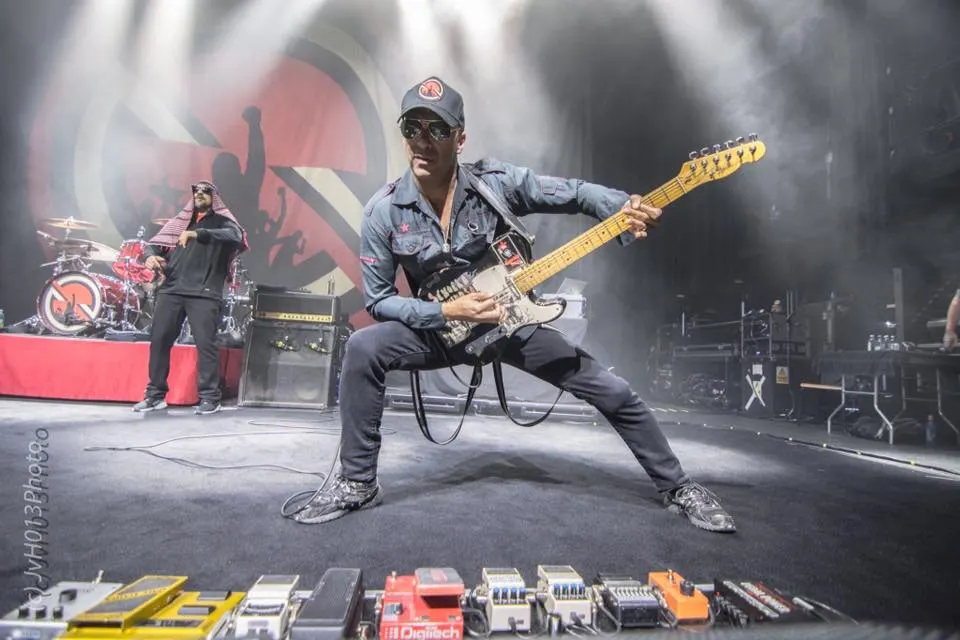 Tom Morello's pedalboard photographed live on stage during a tour.